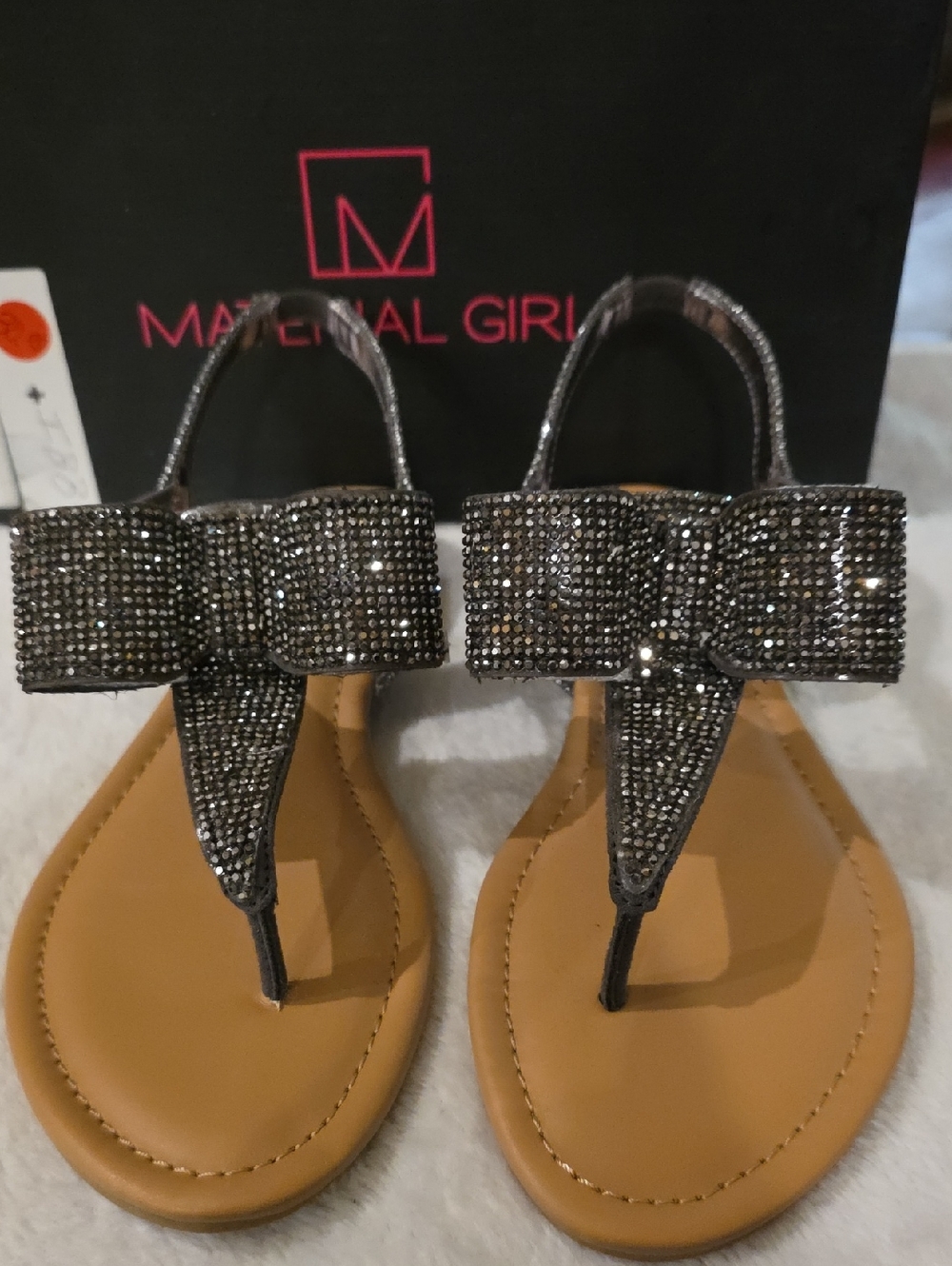Material Girl Gunmetal Rhinestone Bow Thong Sandals